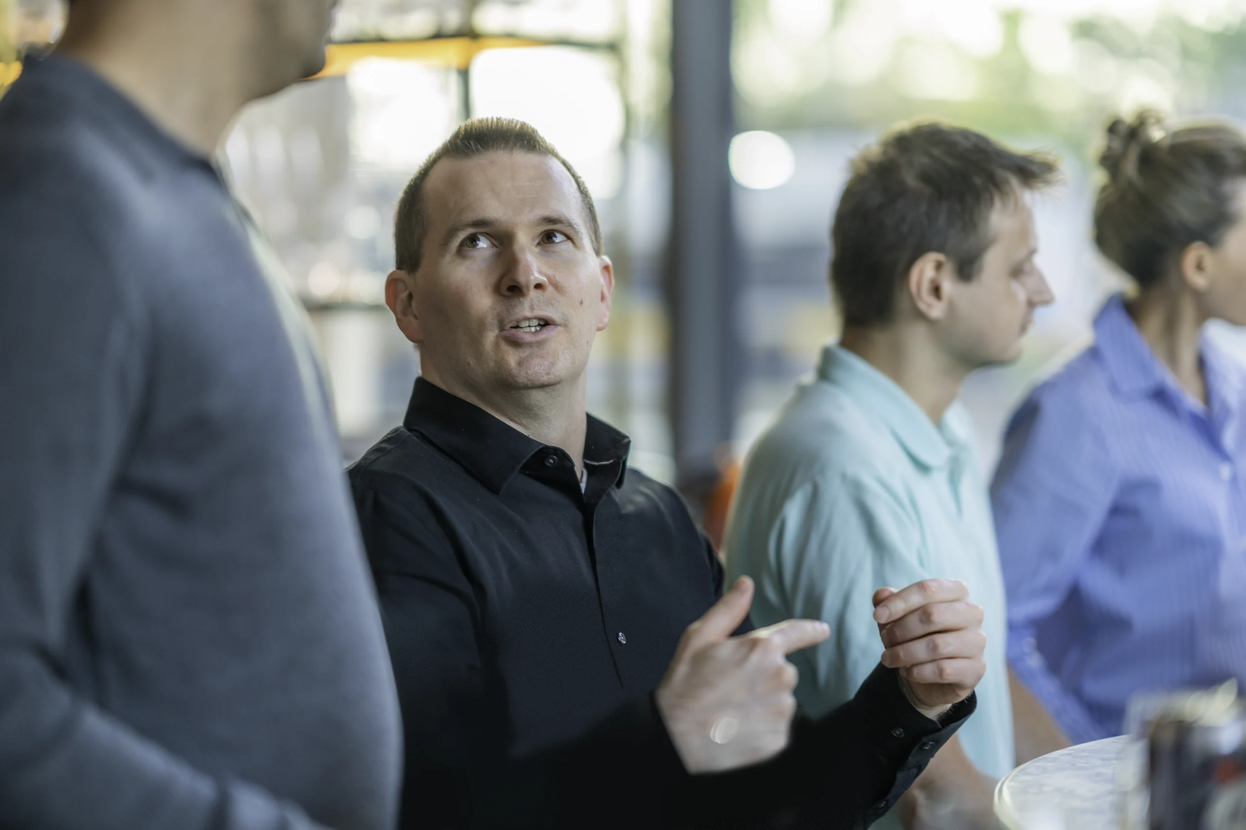 Psivant employees in conversation.