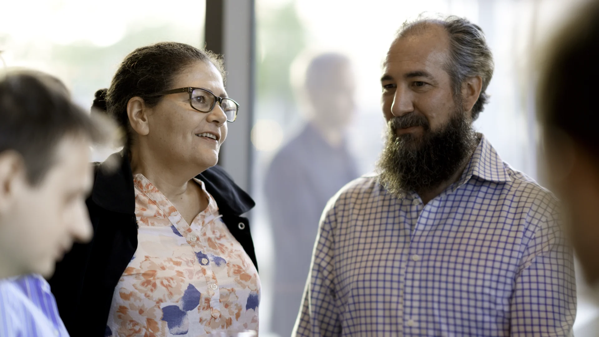 Psivant employees in conversation.