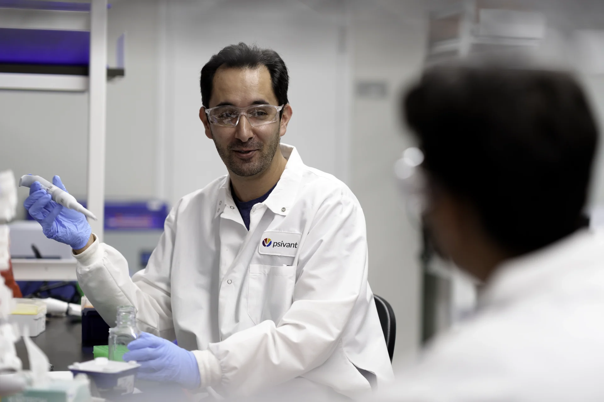 Psivant employees in the lab.