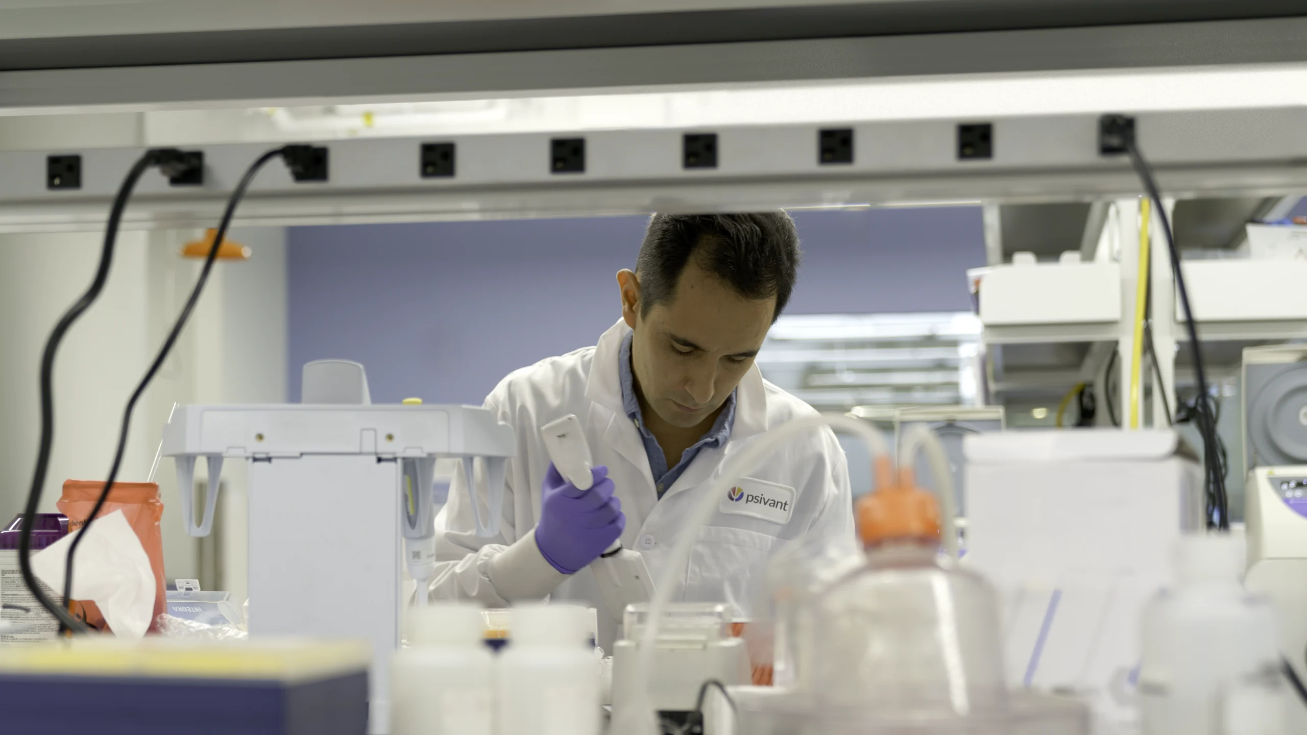 Psivant employee in the lab.